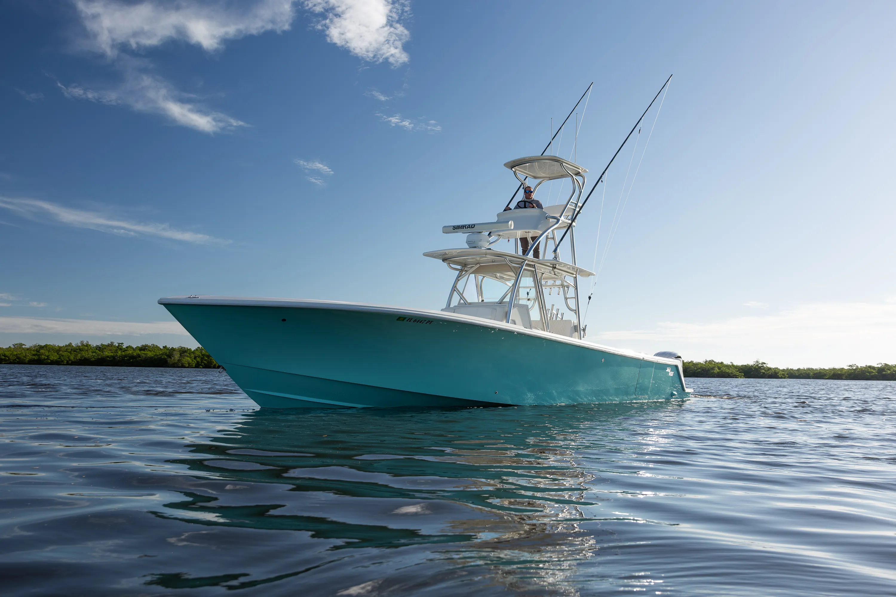 SeaVee 39: bow quarter low angle backlit